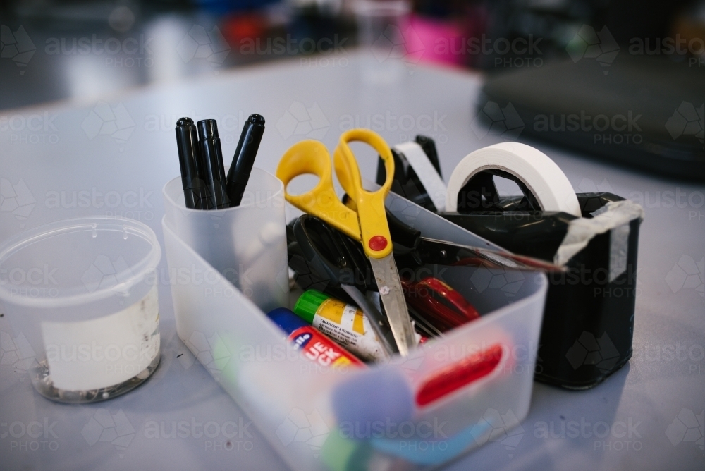 School supplies including scissors, tape, glue and pens - Australian Stock Image