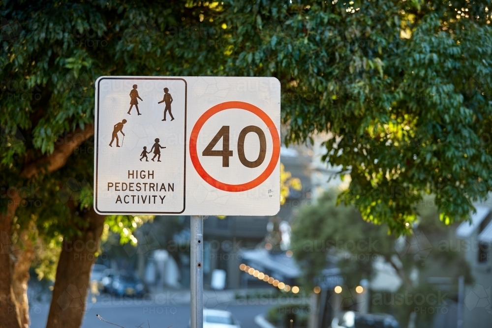 School zone sign on leafy street - Australian Stock Image