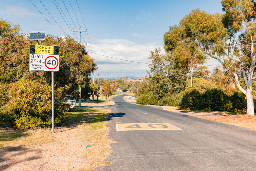 School zone traffic signs with 40kmh speed limit in small regional town - Australian Stock Image