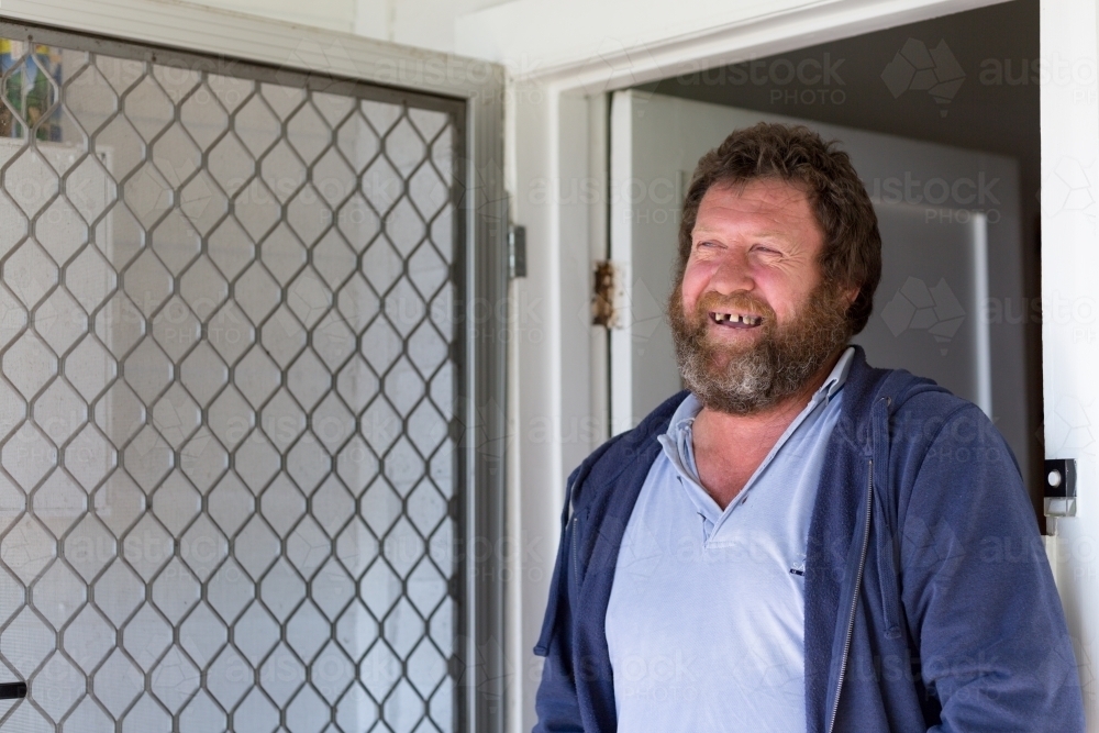 Scruffy man with smile - Australian Stock Image