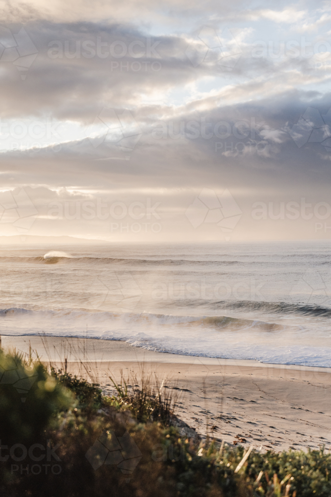 Sea mist on sunrise waves - Australian Stock Image