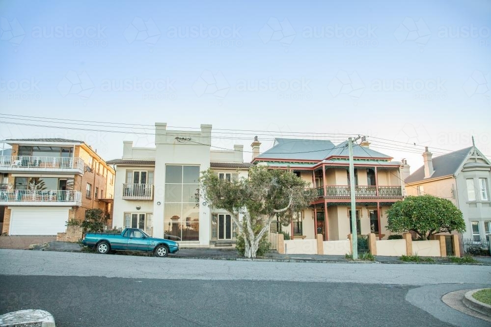 Seaside houses with a car parked out the front - Australian Stock Image
