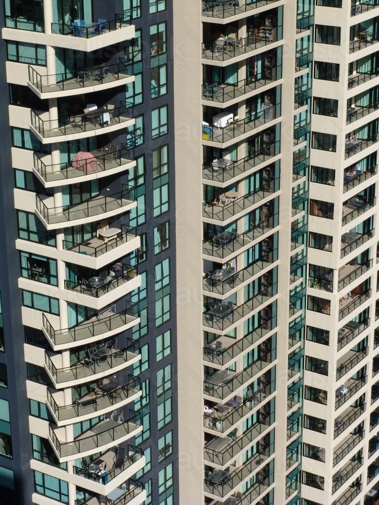 Section of a high rise building with window and balcony detail - Australian Stock Image