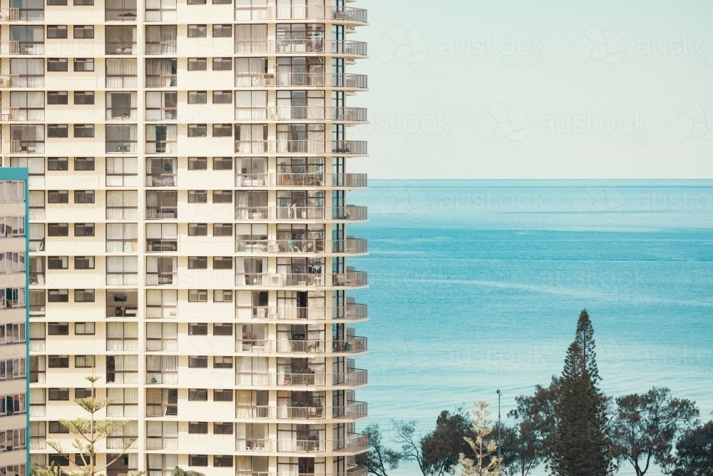 Image of Section of highrise apartment building by the beach in seaside ...