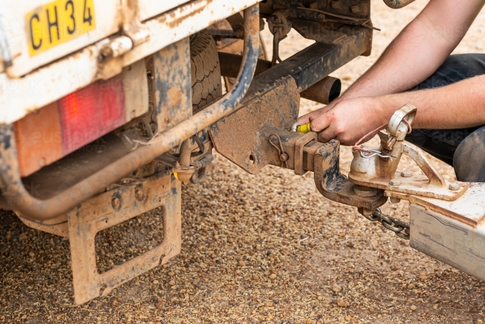 Securing a trailer behind a vehicle - Australian Stock Image