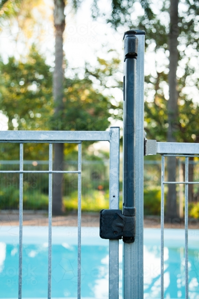 Image of Self closing pool gate with child proof latch to open