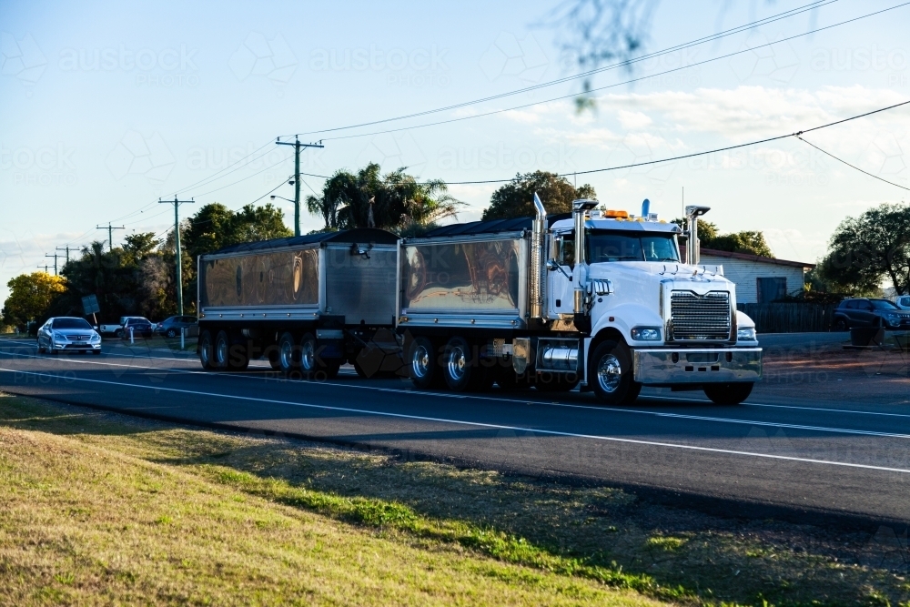 Semi trailer truck on highway going through Muswellbrook, New South Wales - Australian Stock Image