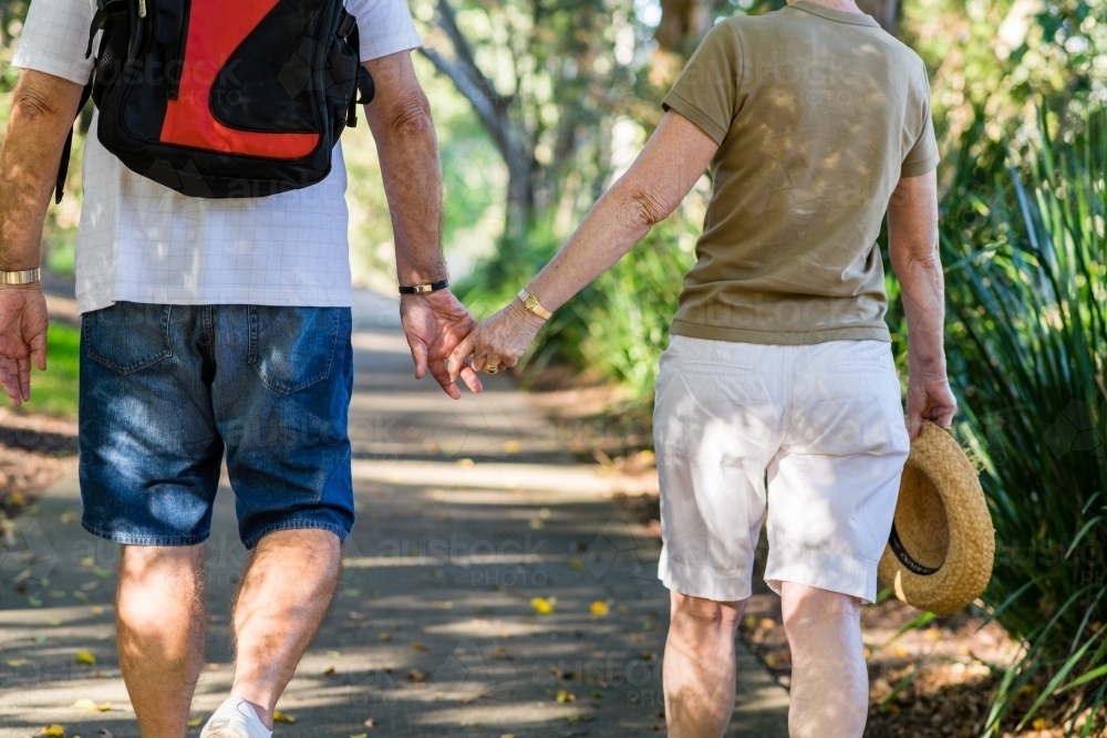 senior couple on a walk together - Australian Stock Image