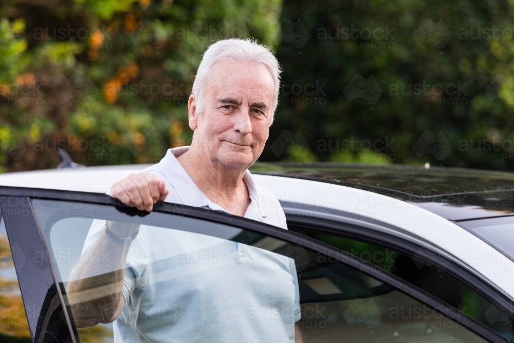 senior man with car - Australian Stock Image