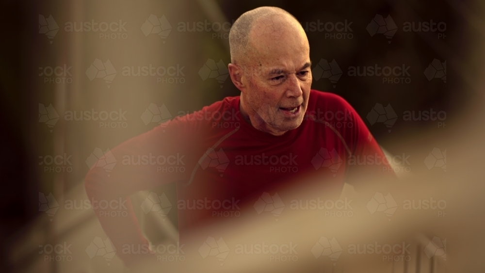 Senior Mature Runner in the morning - Australian Stock Image