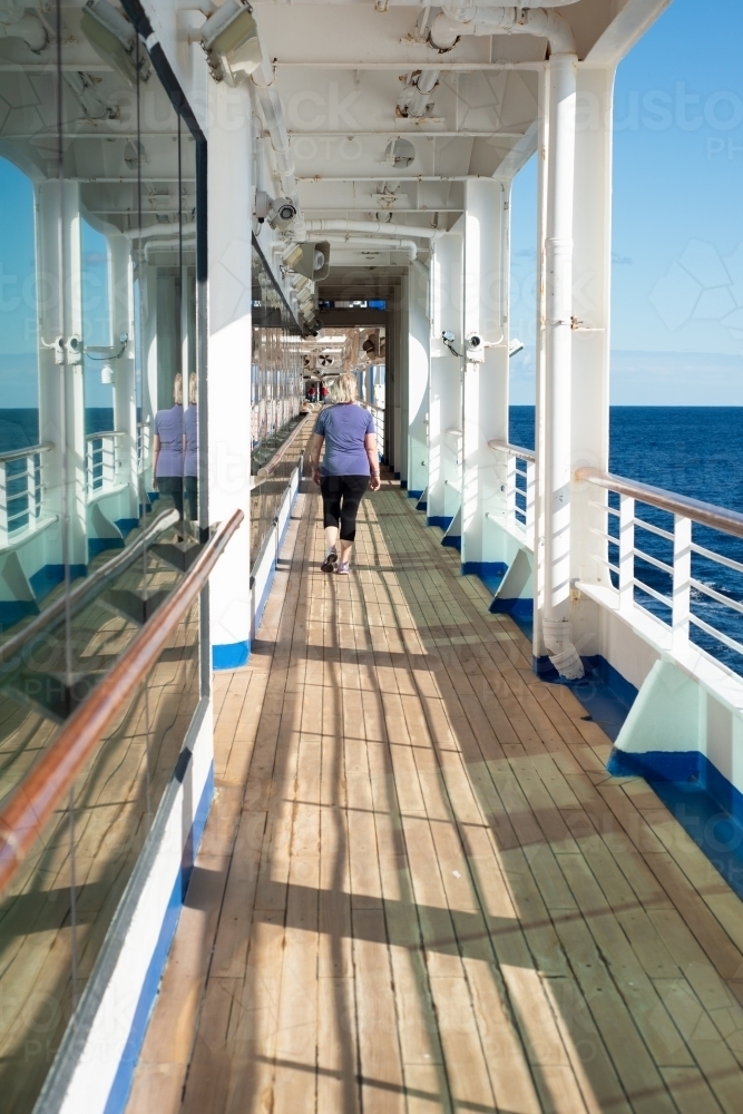 senior woman on a cruise vacation - Australian Stock Image