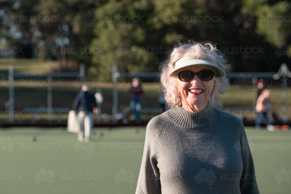 Seniors Playing Lawn Bowls Outdoors - Australian Stock Image
