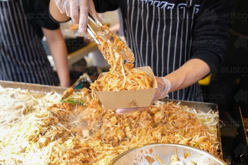 Serving Pad Thai, Thai street food - Australian Stock Image