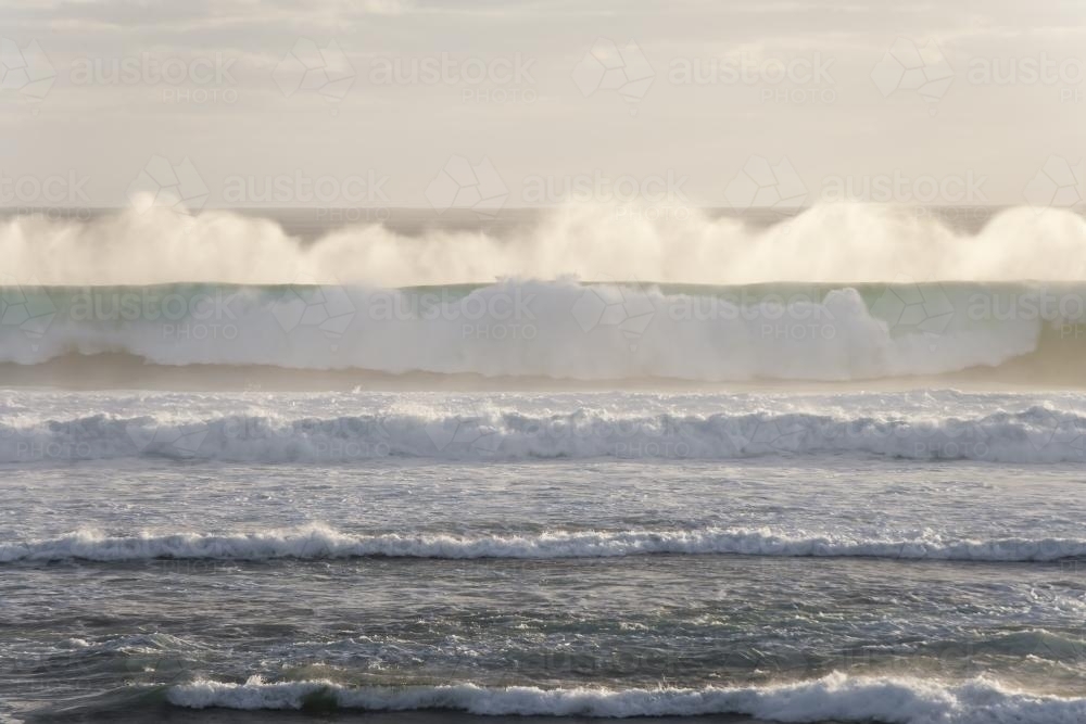 Set of waves crashing and sea spray - Australian Stock Image
