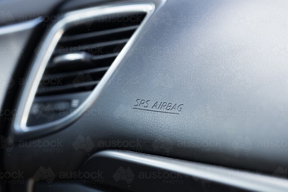 shallow depth of field of a car dashboard with focus on the word air in SRS airbag - Australian Stock Image