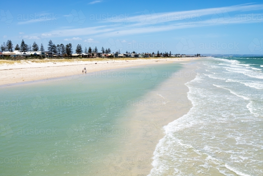 shallow waters and sand bar on city beach - Australian Stock Image