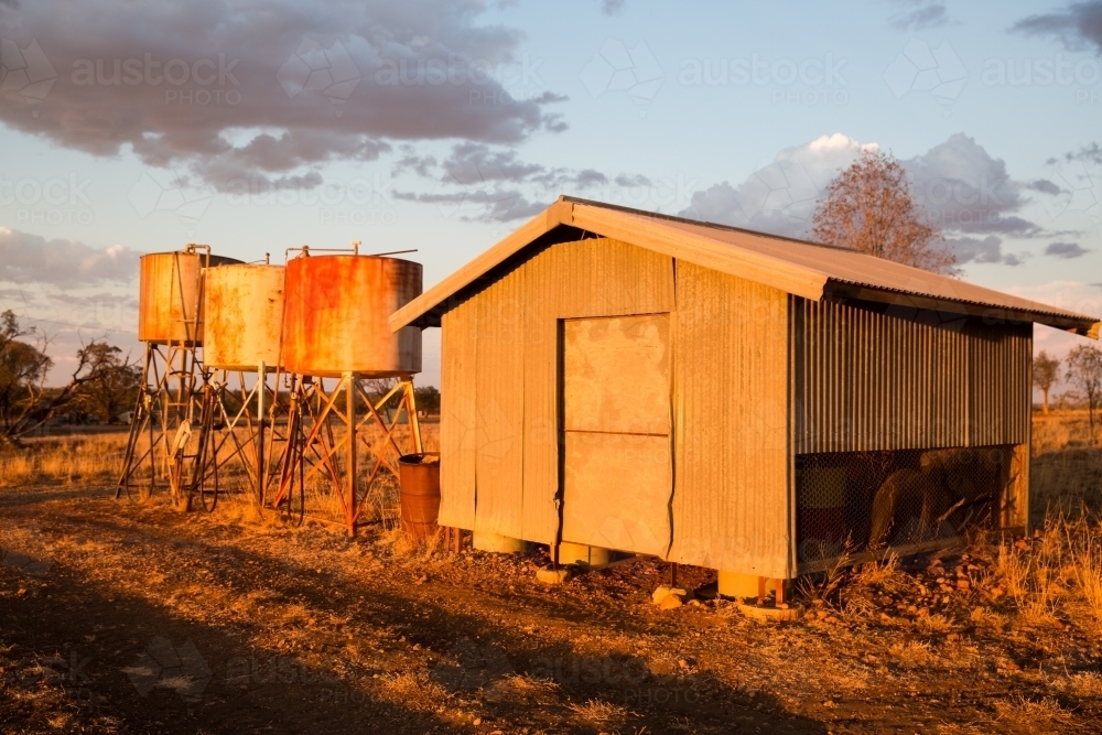 Shed and fuel tanks on farm - Australian Stock Image