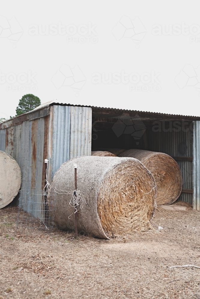 Shed and hay bales in the country - Australian Stock Image