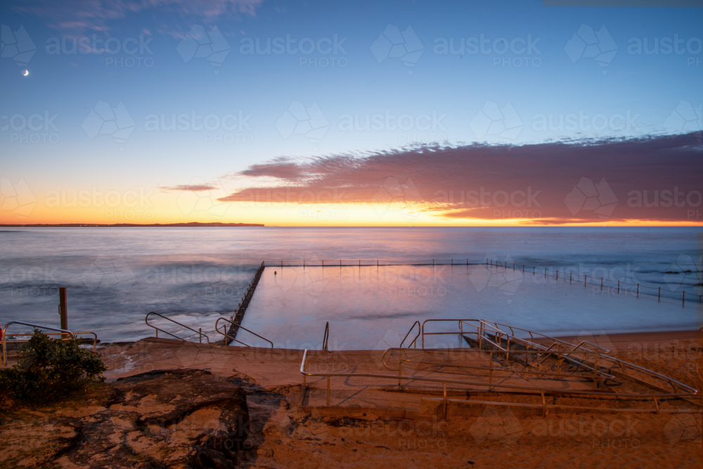 Shelly Park ocean pool at sunrise - Australian Stock Image