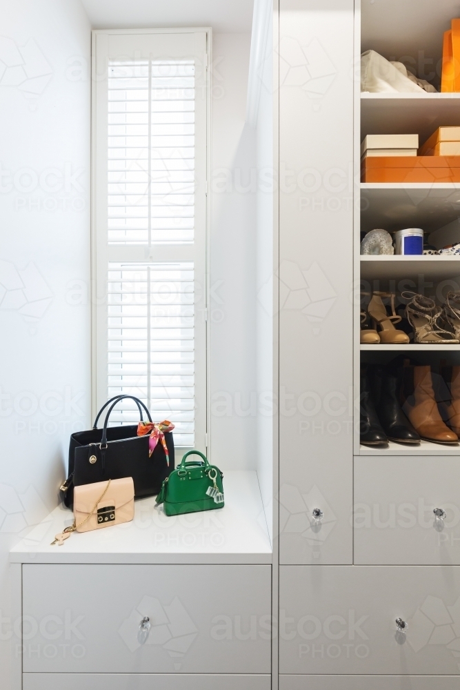Shelving detail in a luxury walk in wardrobe - Australian Stock Image