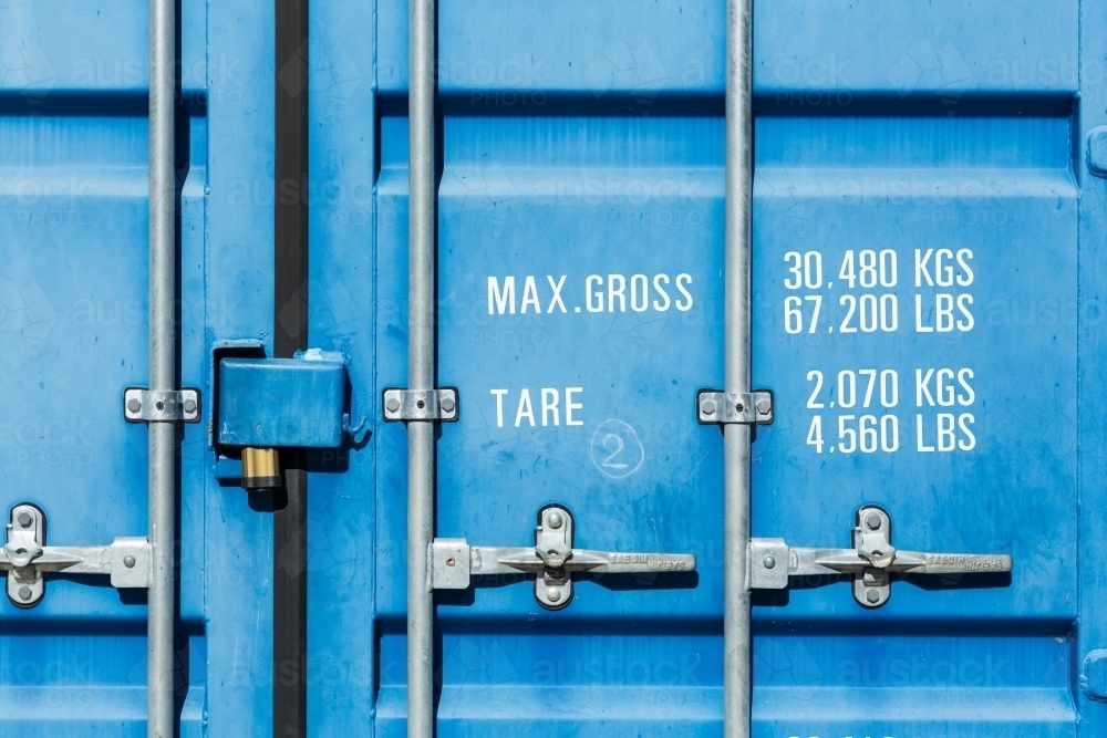 Shipping container detail with printing on doors - Australian Stock Image
