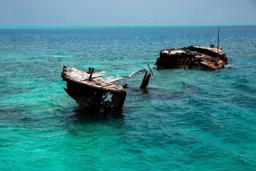Shipwreck on the reef off Heron Island - Australian Stock Image