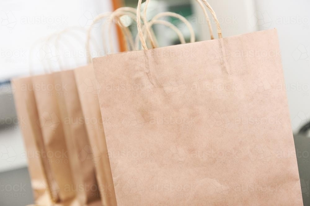 Image of Shopping bags in plain brown paper Austockphoto