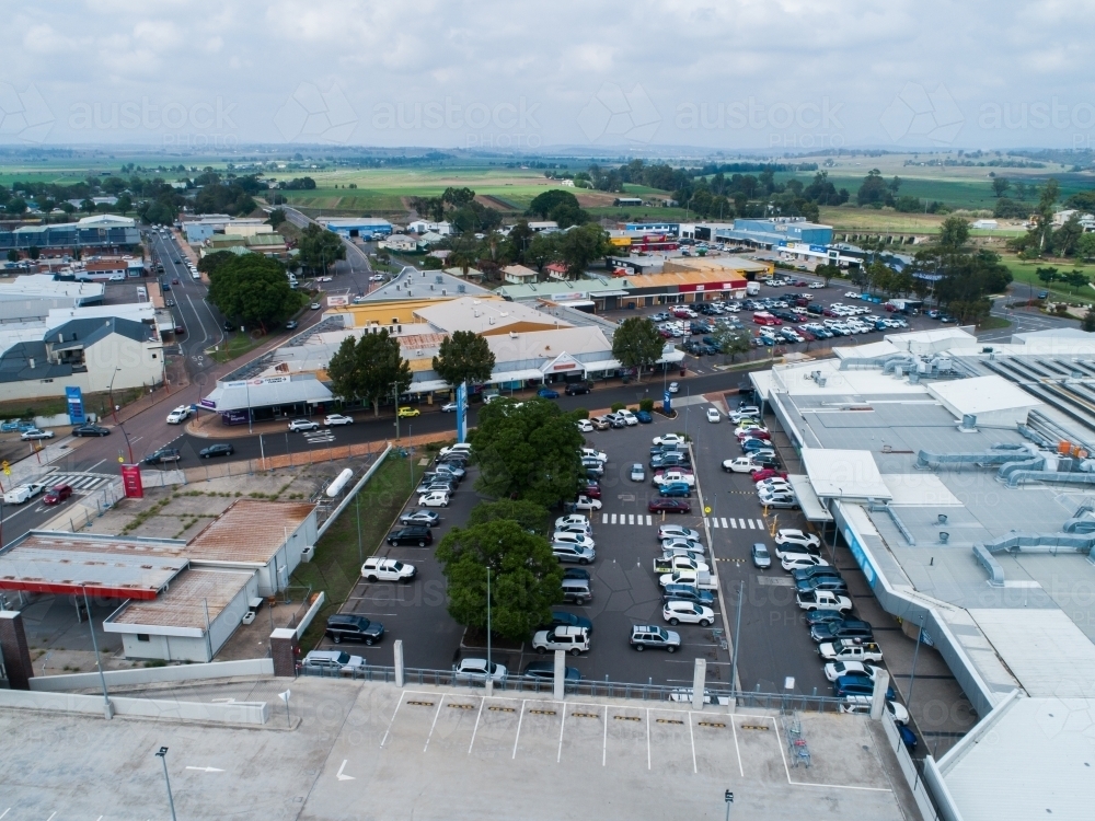 Shopping center with car park beside it in Singleton - Australian Stock Image