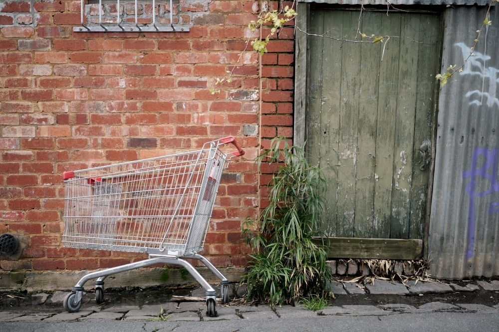 Shopping Trolley Abandoned in a Lane - Australian Stock Image
