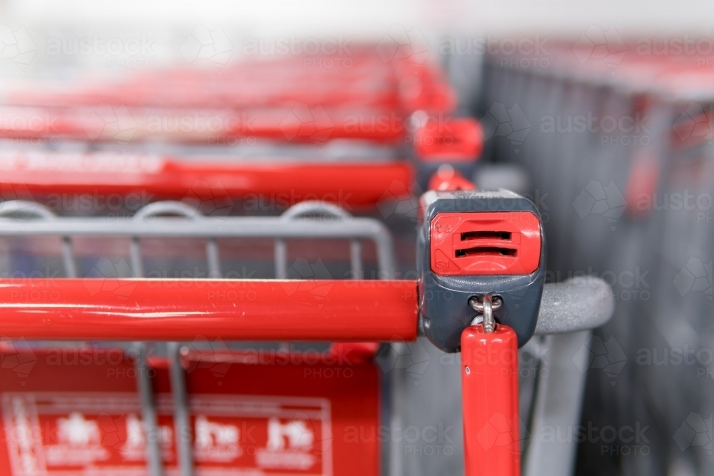 Shopping trolleys neatly lined up. - Australian Stock Image