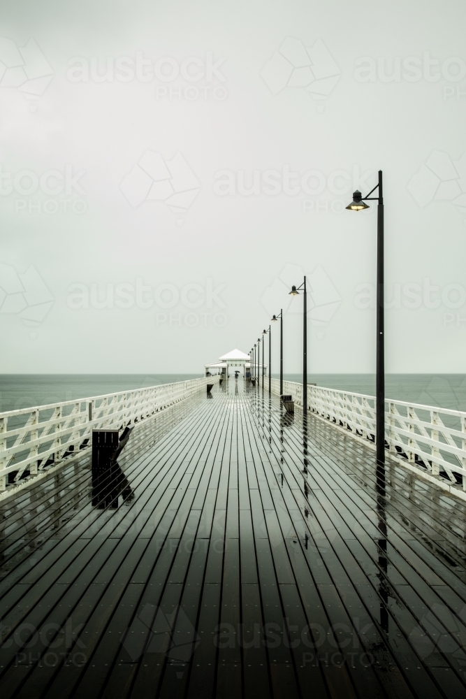 Shorncliffe Pier on a wet winter day. - Australian Stock Image