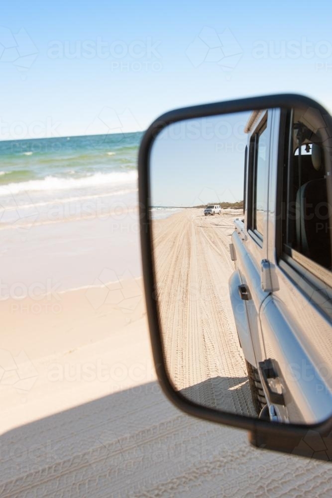 Side mirror on a 4x4 at the beach - Australian Stock Image