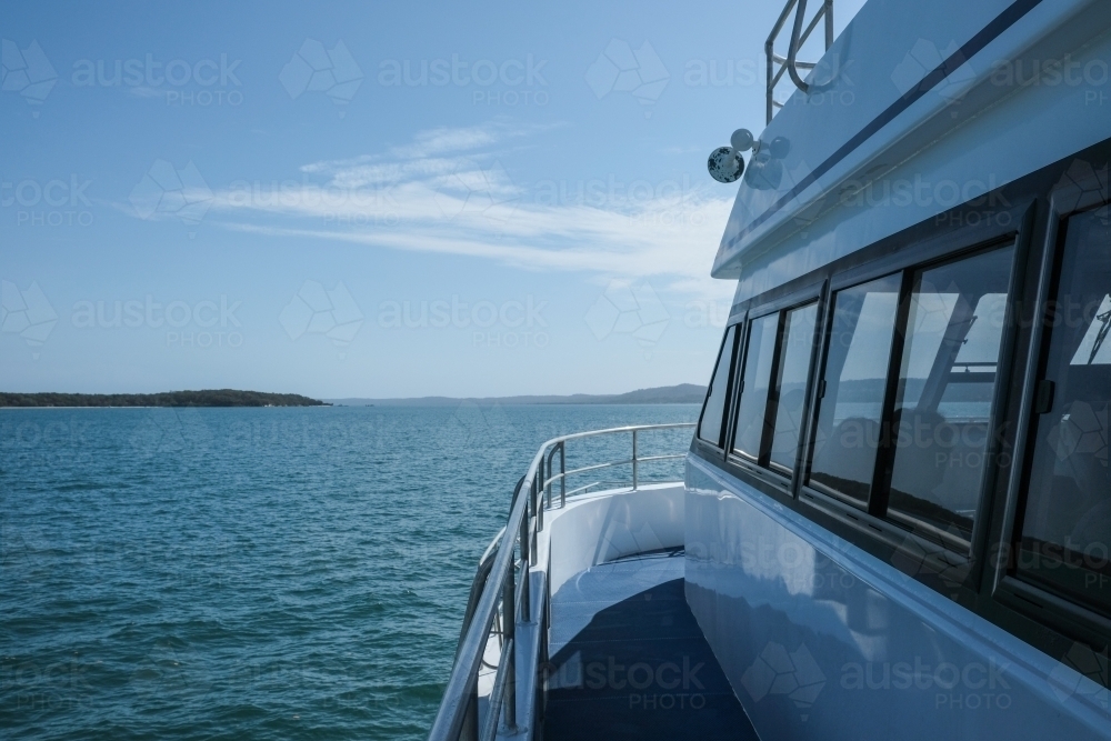 Side of ferry boat on water going to Dunwich - Australian Stock Image