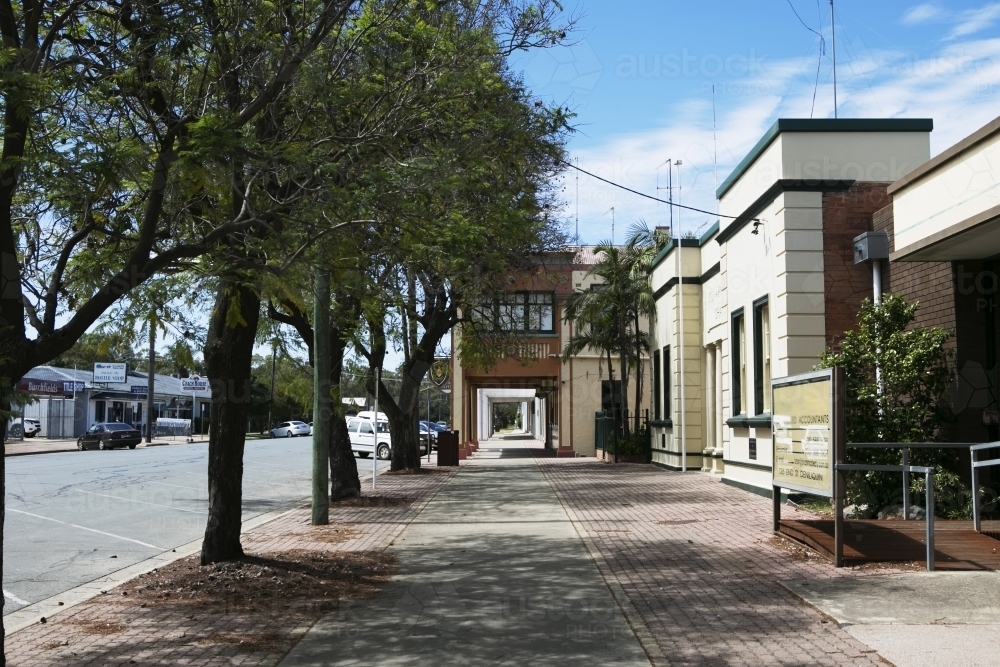 Sidewalk and buildings in town - Australian Stock Image