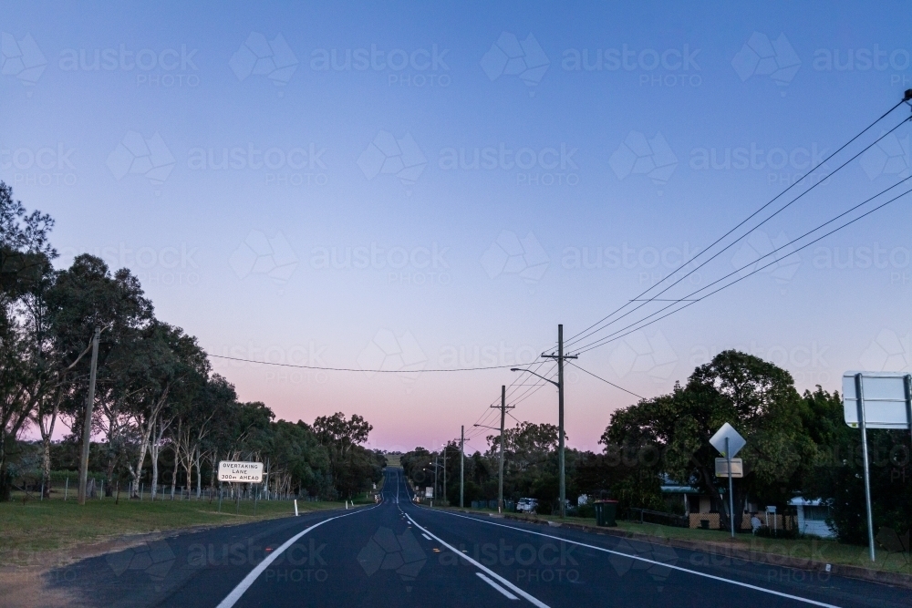 Image of Sign along road for overtaking lane 300m ahead at dusk ...
