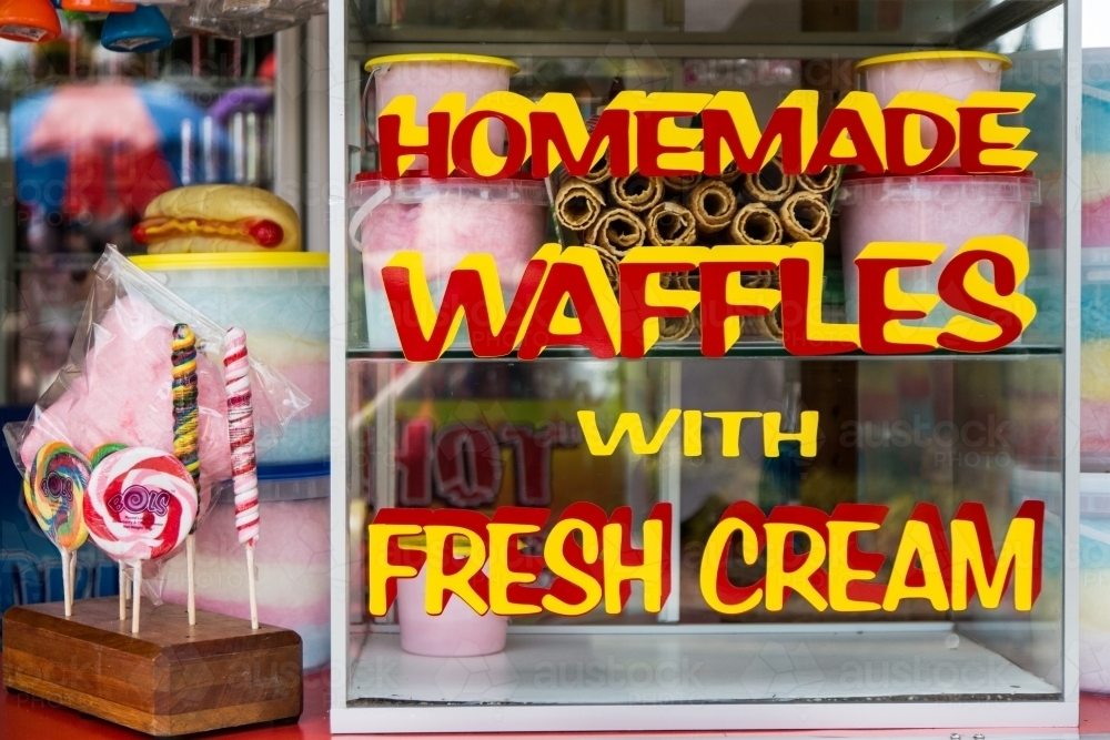 Sign for homemade waffles and cream at a carnival - Australian Stock Image
