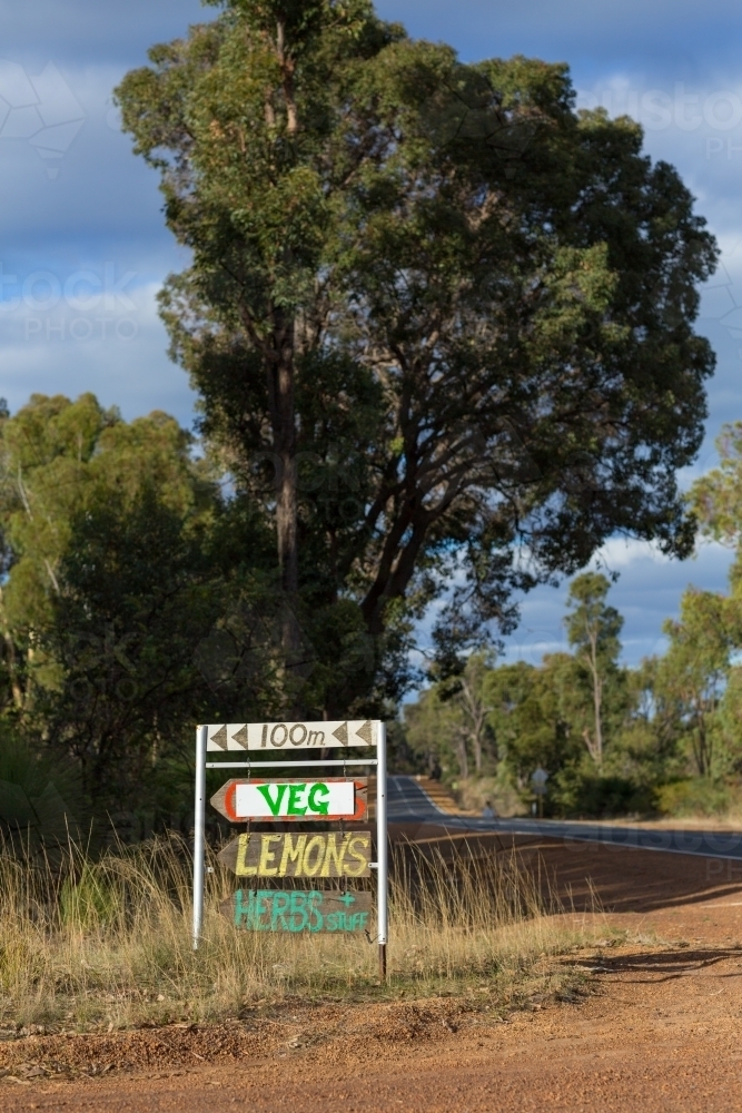 Sign for roadside stall selling veggies - Australian Stock Image