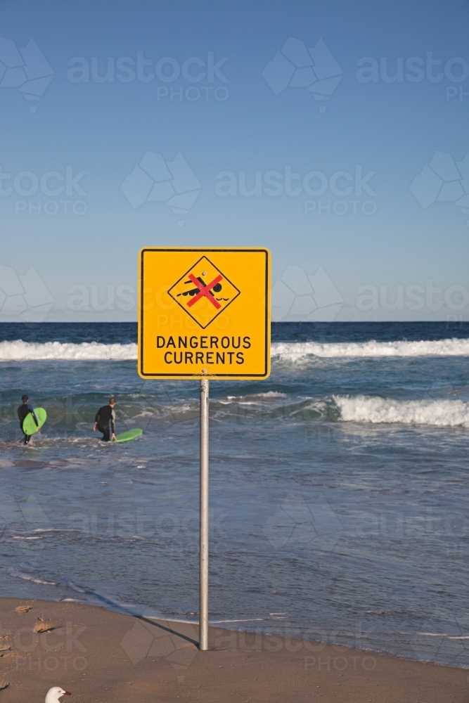 Sign on Bondi Beach - dangerous current - Australian Stock Image