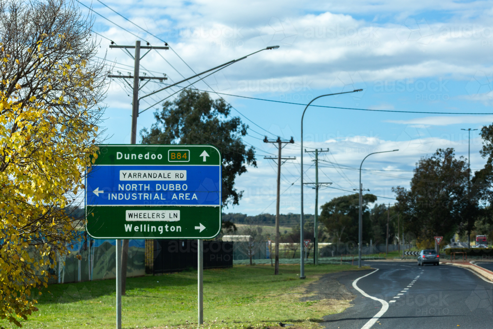 Sign on outskirts of Dubbo with directions to Dunedoo and Wellington - Australian Stock Image