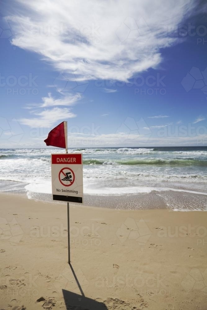 Sign warning of dangerous condition at the beach - Australian Stock Image