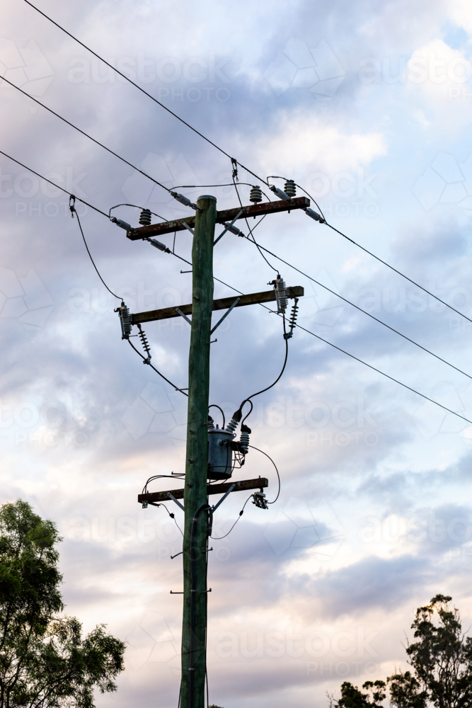 Silhouette of powerline and power pole - Australian Stock Image