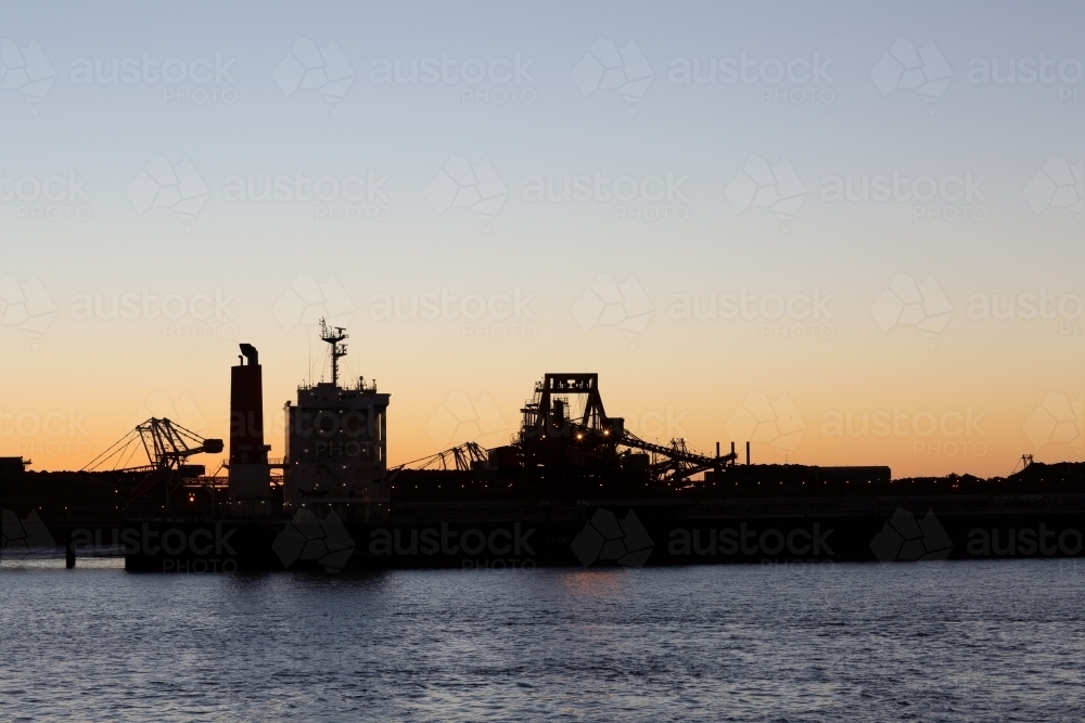 Silhouette of ships in harbour at Port Hedland - Australian Stock Image