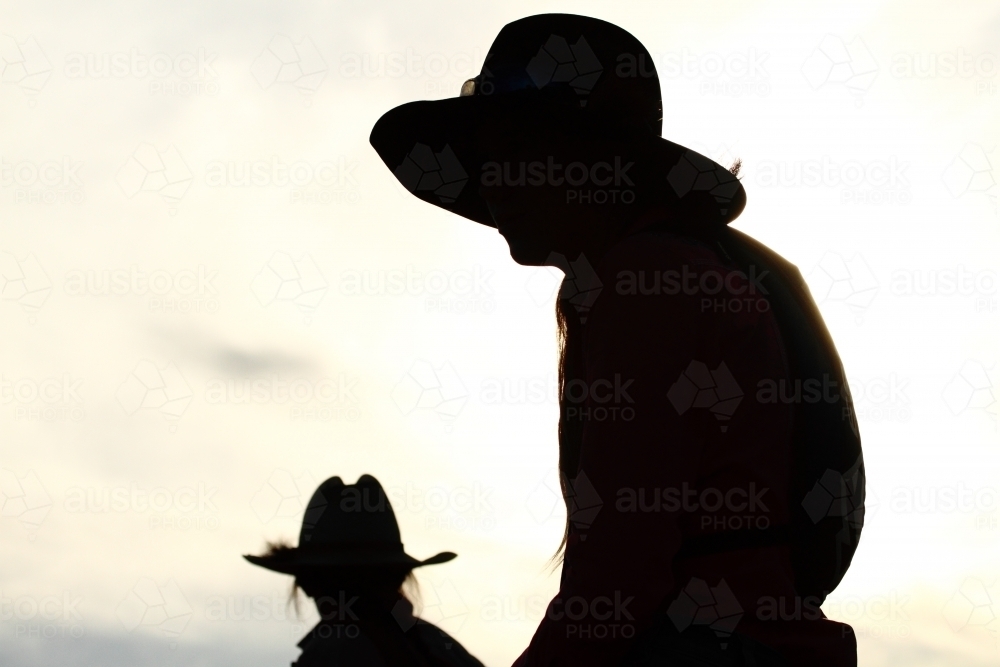 Silhouette of two country girls in their twenties - Australian Stock Image