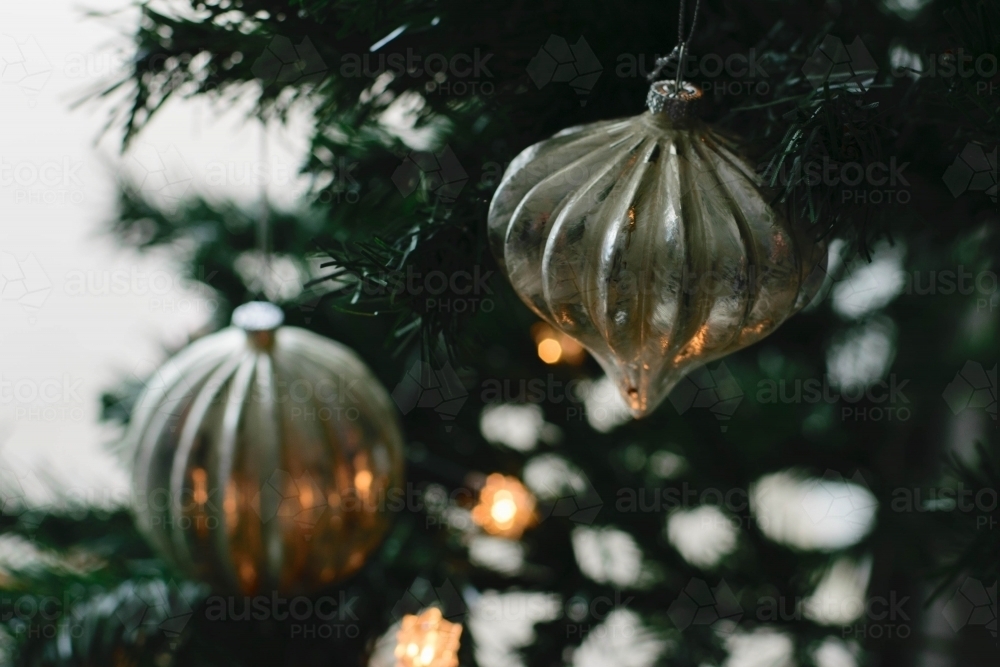 Silver Glass Baubles on Christmas Tree with lights - Australian Stock Image
