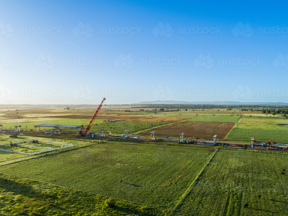 Singleton Bypass under construction first girders placed and crane working on bridge building - Australian Stock Image