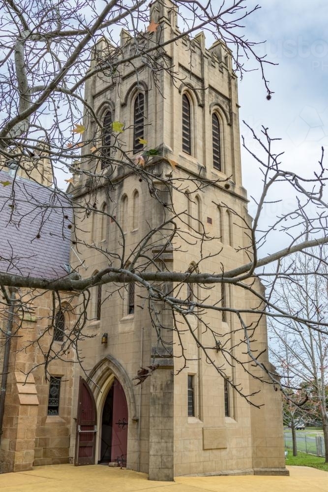 Singleton Catholic Church through tree branches - Australian Stock Image