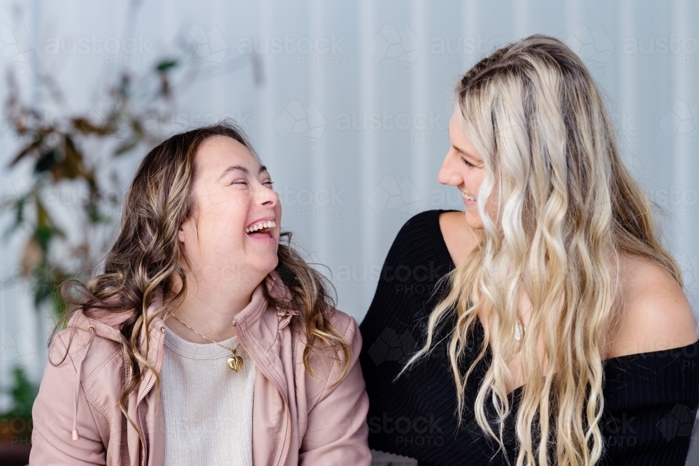 sisters, from a series featuring a woman with Down Syndrome - Australian Stock Image