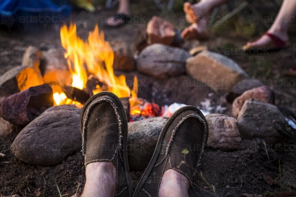 Sitting by the campfire - Australian Stock Image