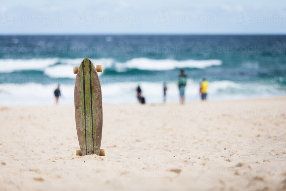 Skateboard on the beach - Australian Stock Image
