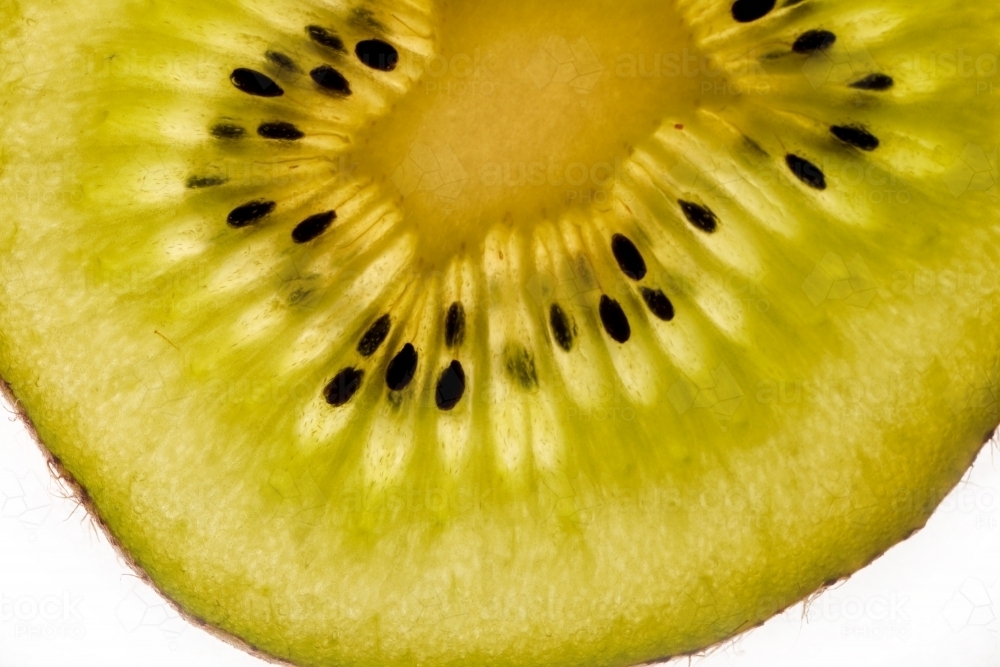 sliced kiwi fruit on white background - Australian Stock Image